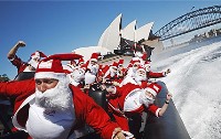 Santas on Sydney Harbour